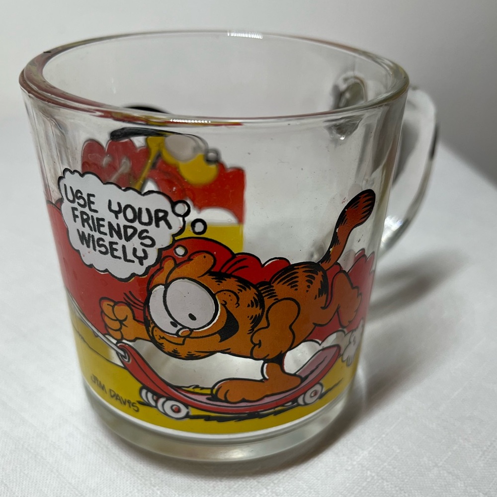 vintage McDonald's Garfield Cat glass mug. 
USE YOUR FRIENDS WISELY Skateboard